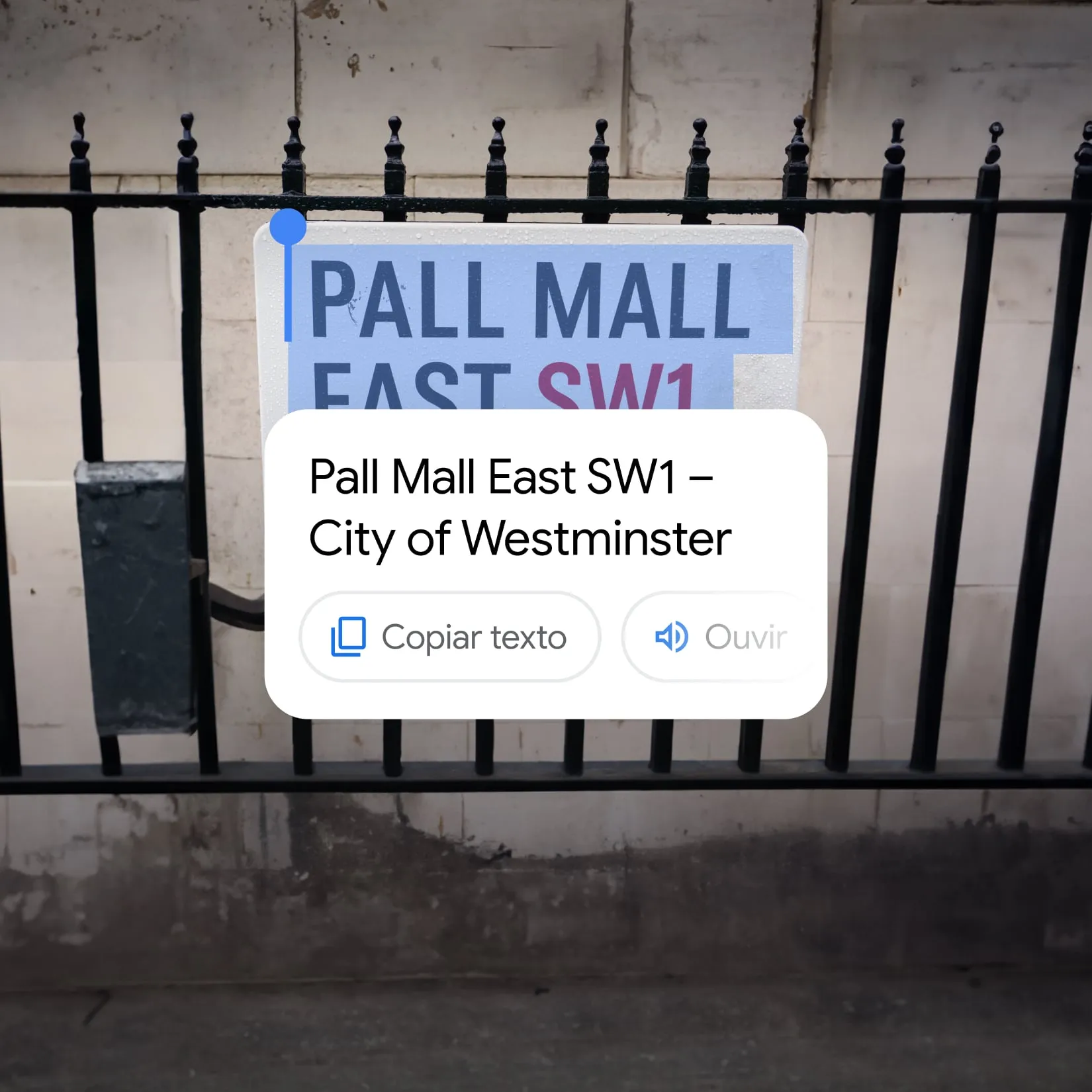 Imagem do recurso de copiar e colar do Google sendo usado em uma placa de rua.